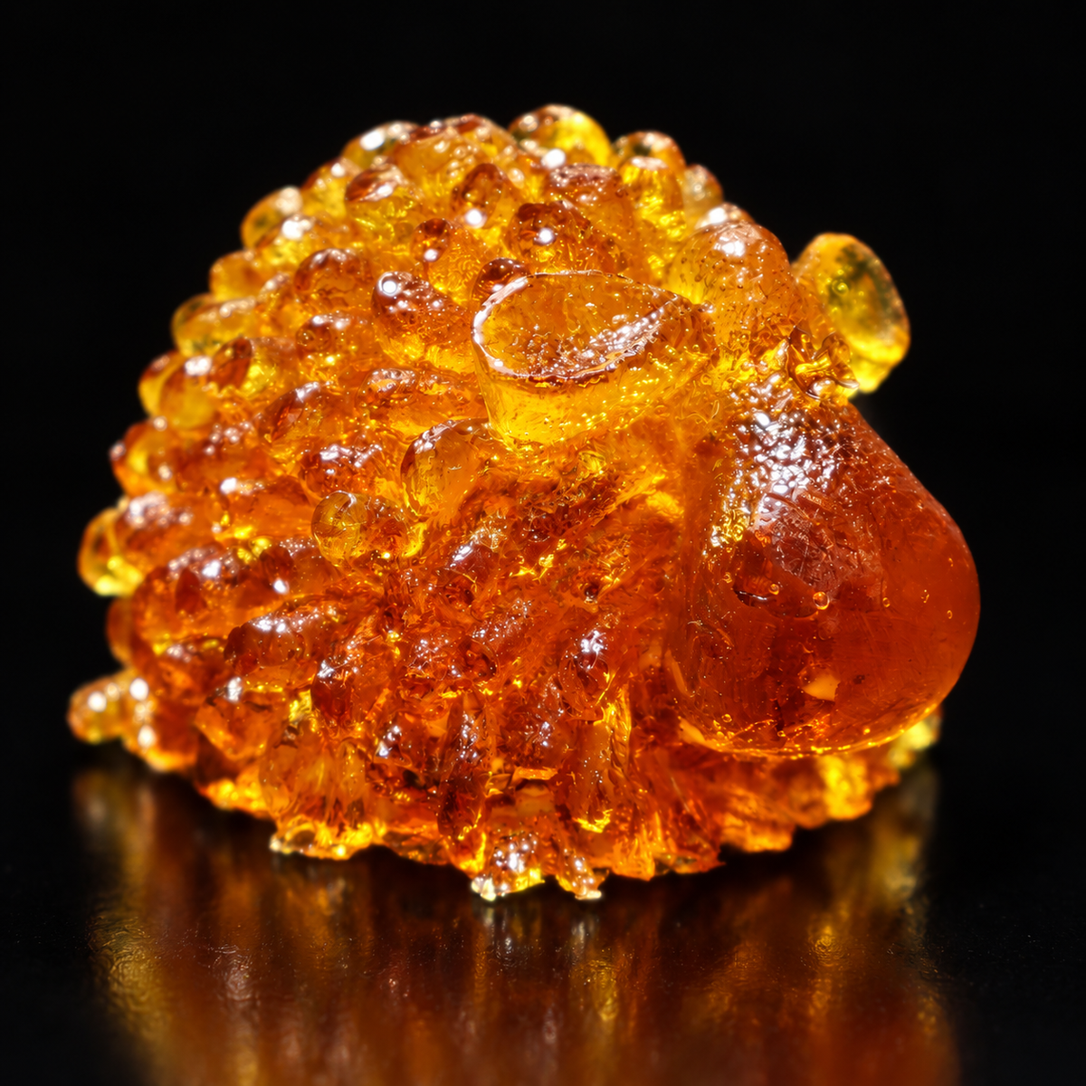 Made in USA Natural Baltic Amber compact sheep figurine by KIZIMA® on a black studio backdrop, Christmas and New Year 2027 stocking stuffer