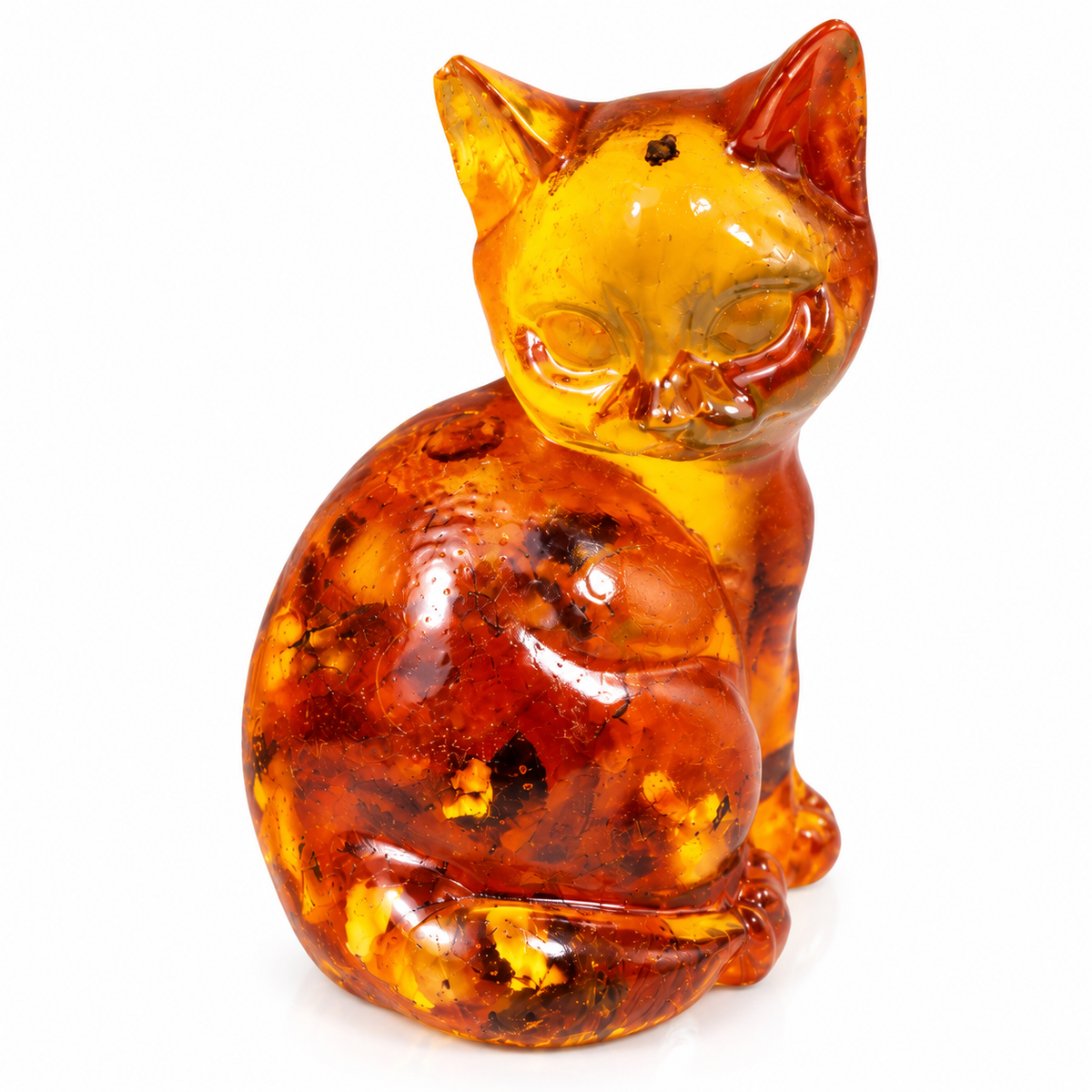 Natural Baltic amber sitting cat figurine on white background, cognac amber with golden flecks, handmade in Brooklyn NY by KIZIMA®