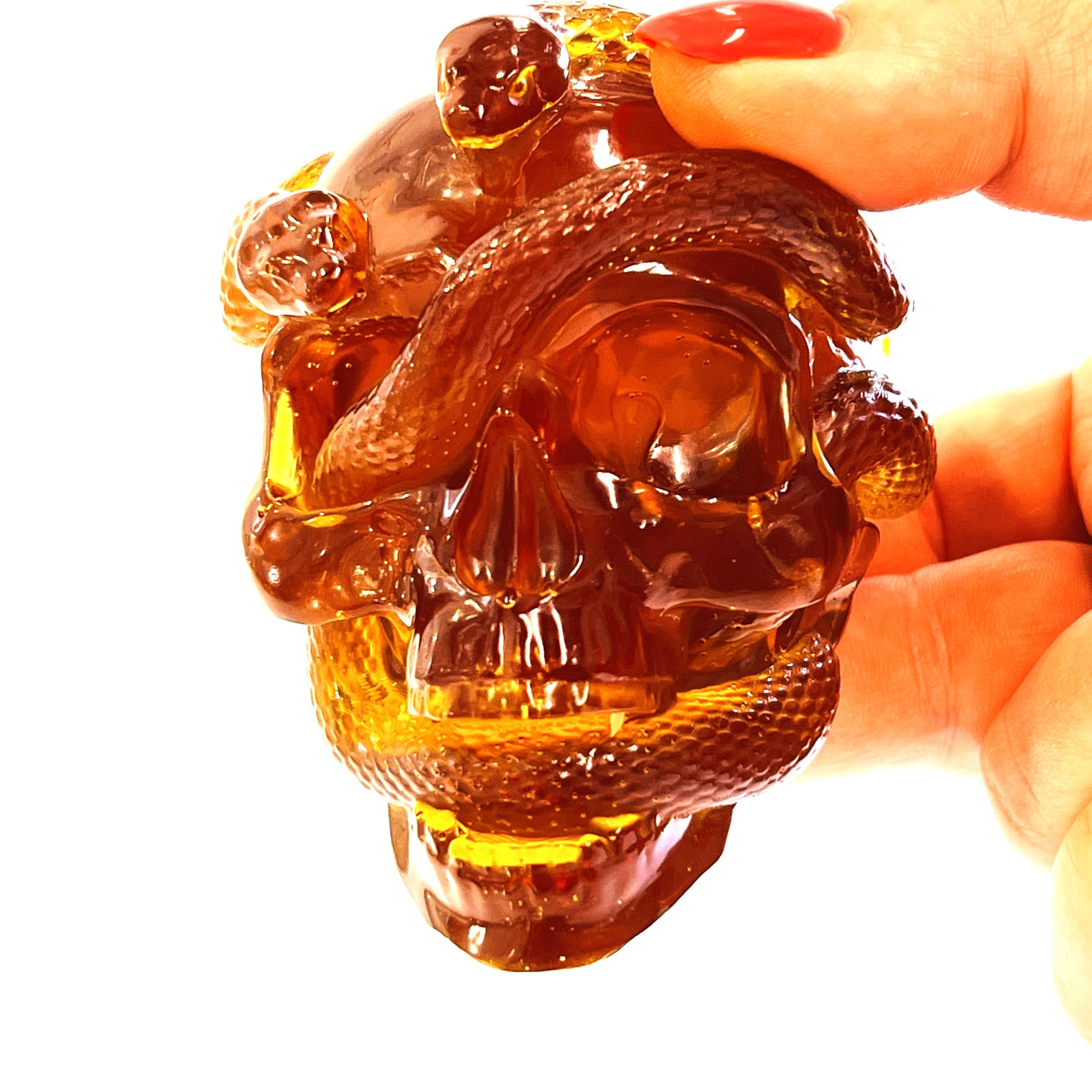 Baltic amber skull and snake figurine, handmade by KIZIMA New York