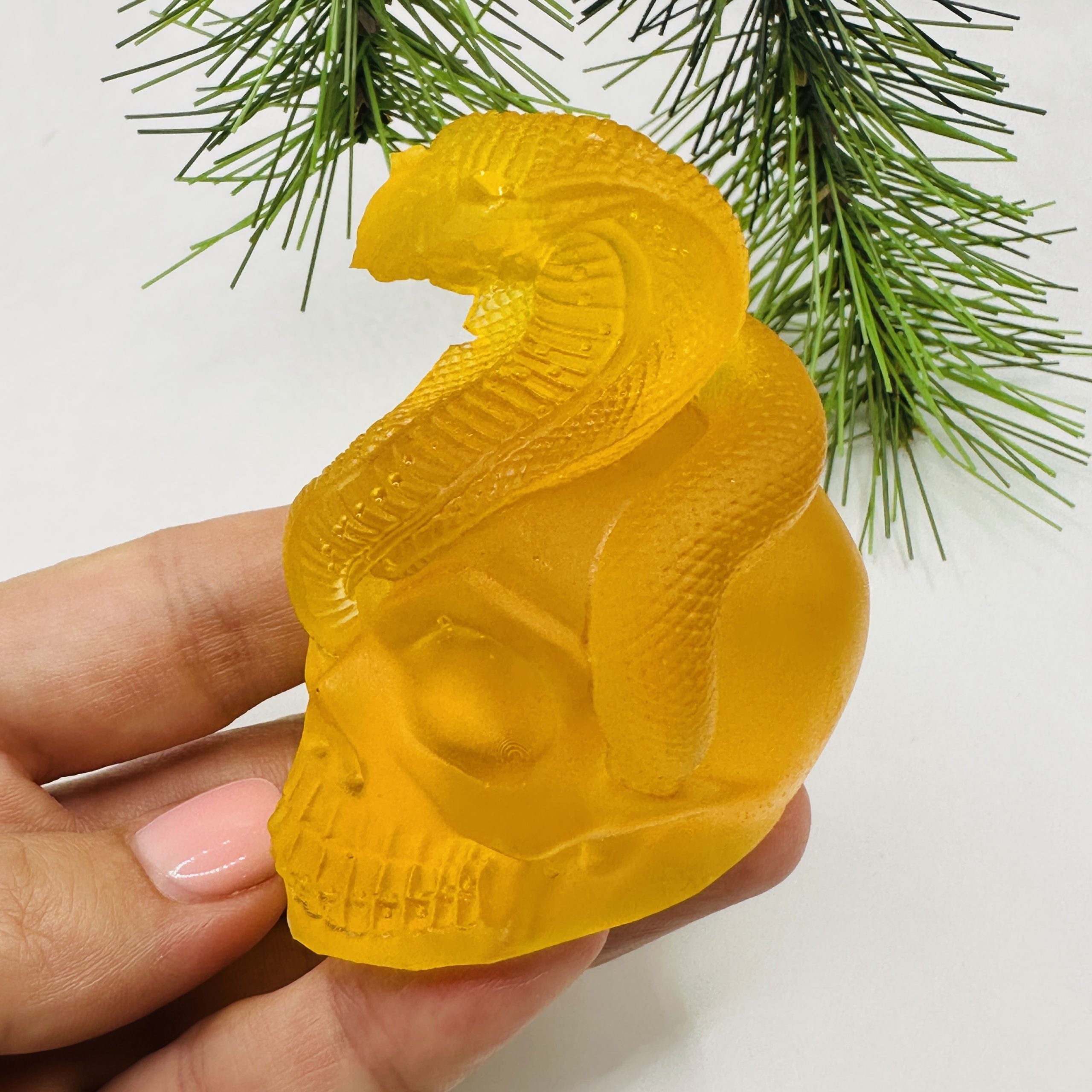 Baltic amber snake and skull figurine, handmade by KIZIMA New York