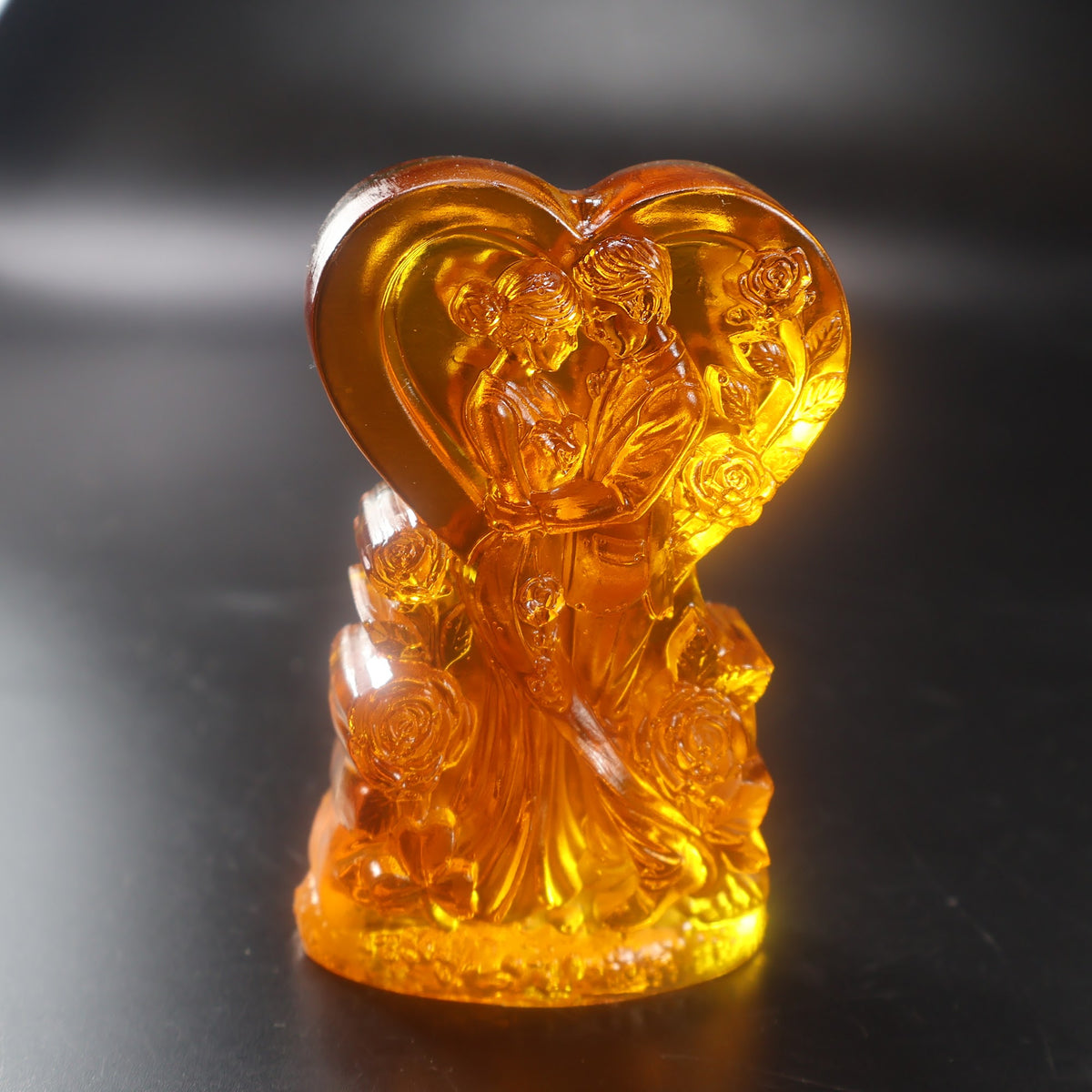 Natural Baltic Amber wedding heart with bride and groom, handcrafted bridal keepsake by KIZIMA® — detail view