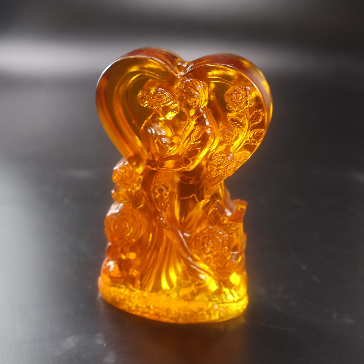 Baltic amber wedding heart sculpture with amber flowers, Made in USA by KIZIMA® — side view