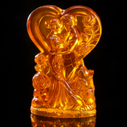 Baltic amber wedding couple heart on a black studio backdrop, handcrafted in Brooklyn New York by KIZIMA®, Made in USA