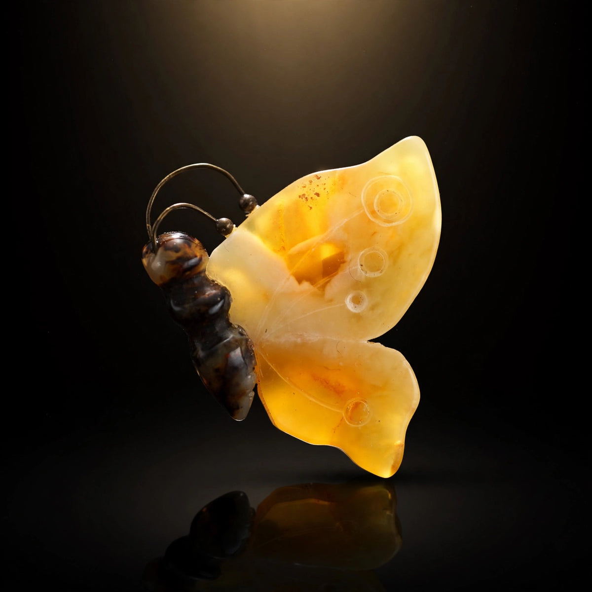Handmade Baltic amber butterfly brooch, luxury studio photo on black background — KIZIMA, Made in USA