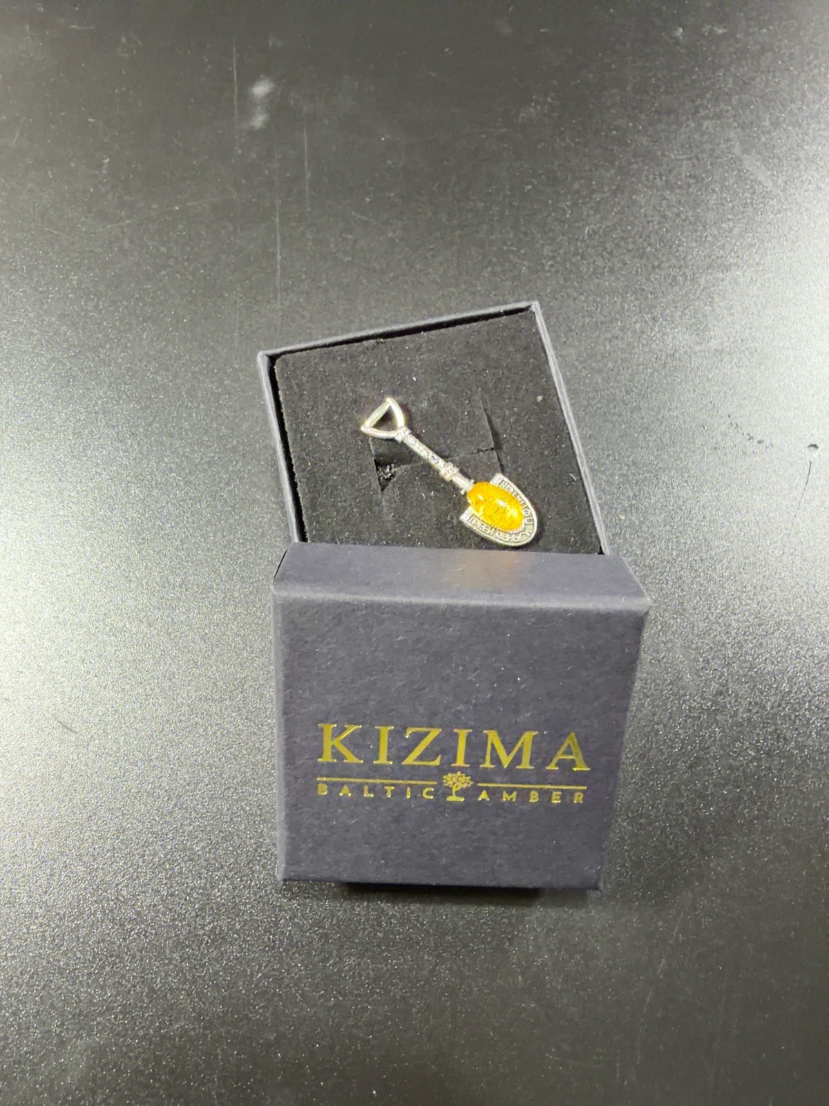 Made in USA Natural Baltic Amber silver money shovel amulet by KIZIMA® in the KIZIMA® gift box