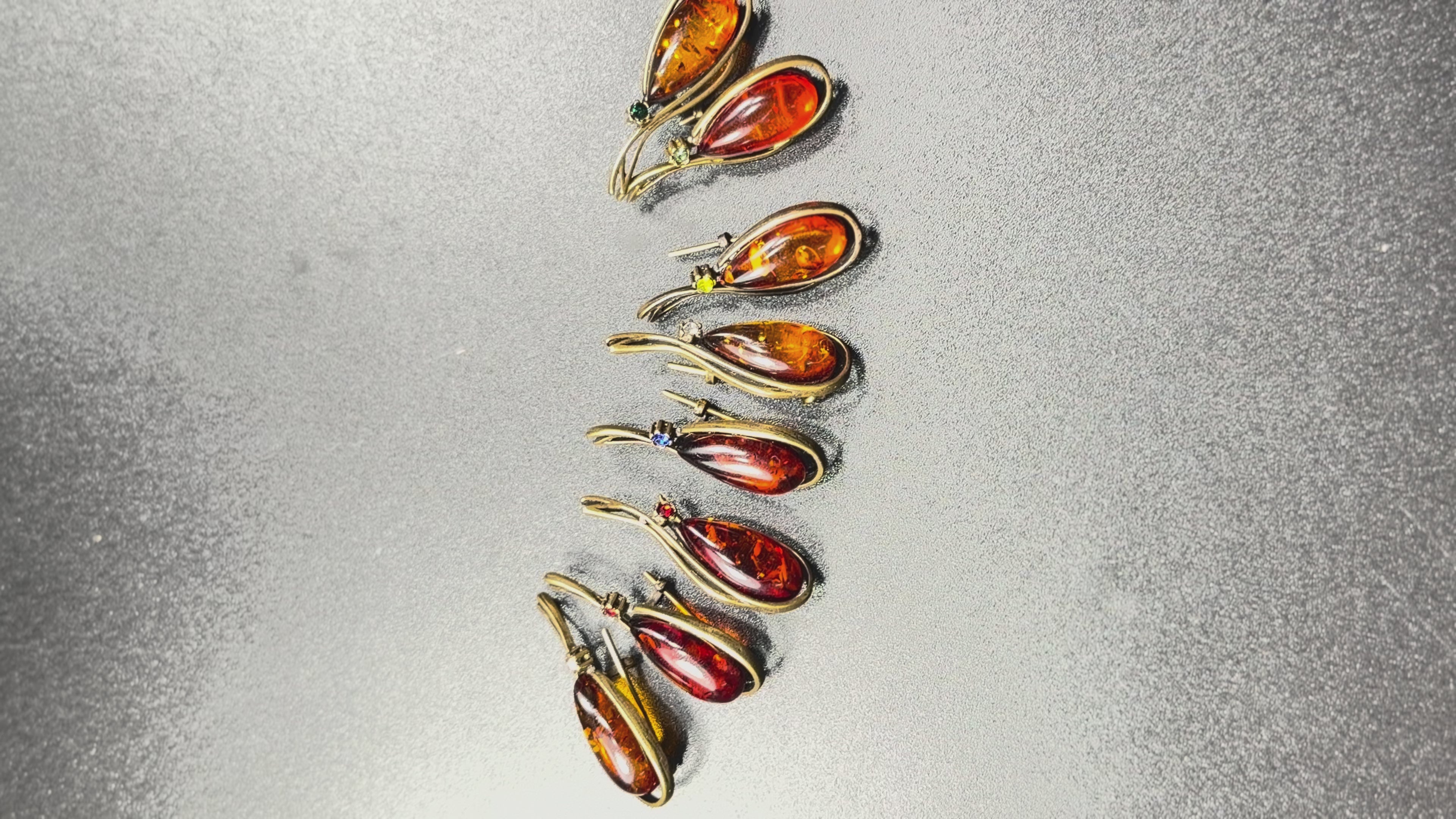 Load video: Made in USA Genuine Natural Baltic Amber Teardrop Brooch, Wire Wrap KIZIMA®