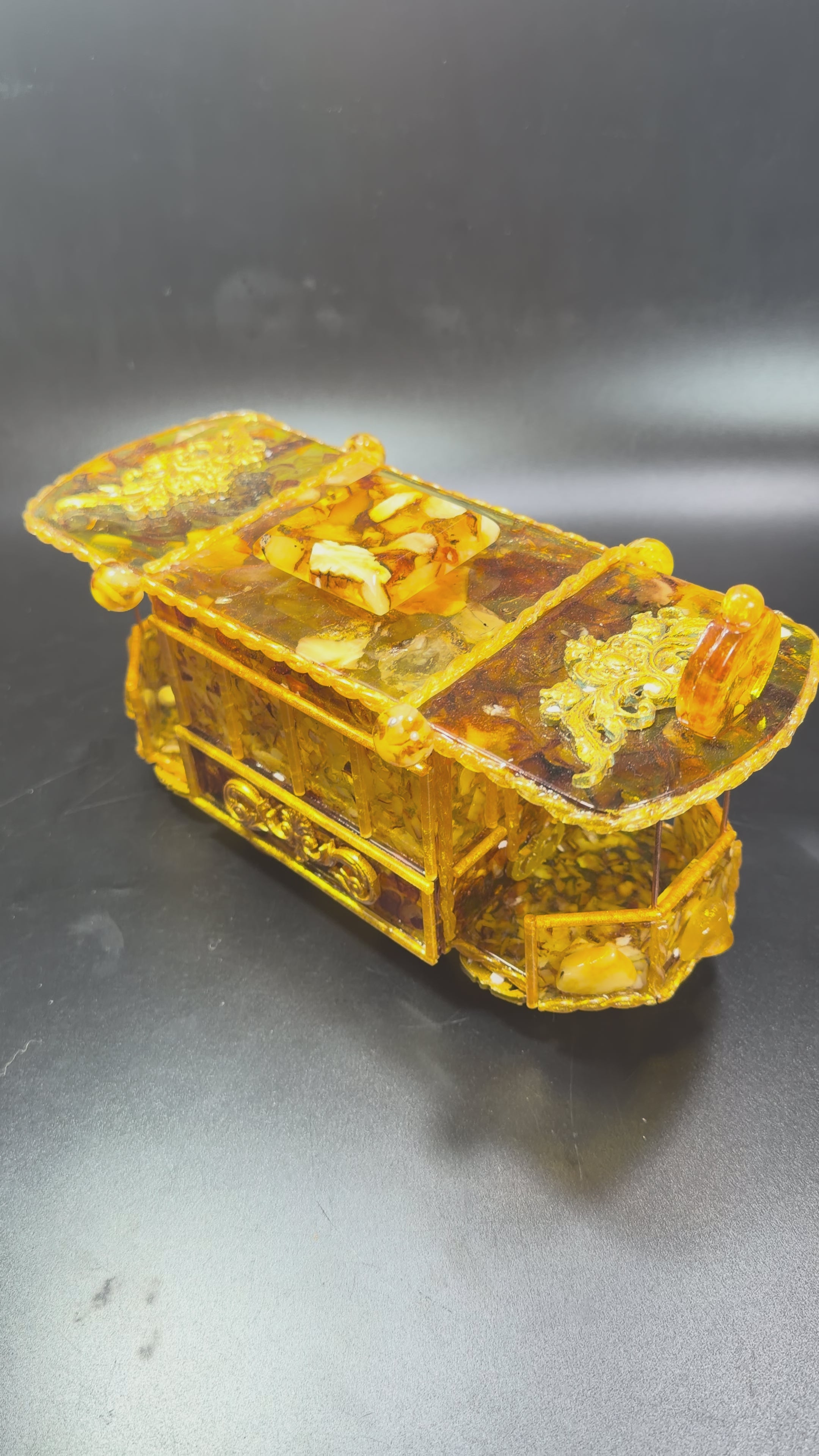 Load video: Product video of Made in USA Natural Baltic Amber vintage tram jewelry box handcrafted by KIZIMA in Brooklyn New York