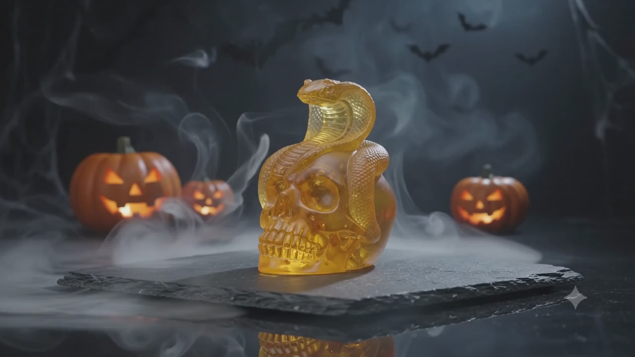 Load video: Made in USA Natural Baltic Amber Snake Skull Mini Figurine KIZIMA®