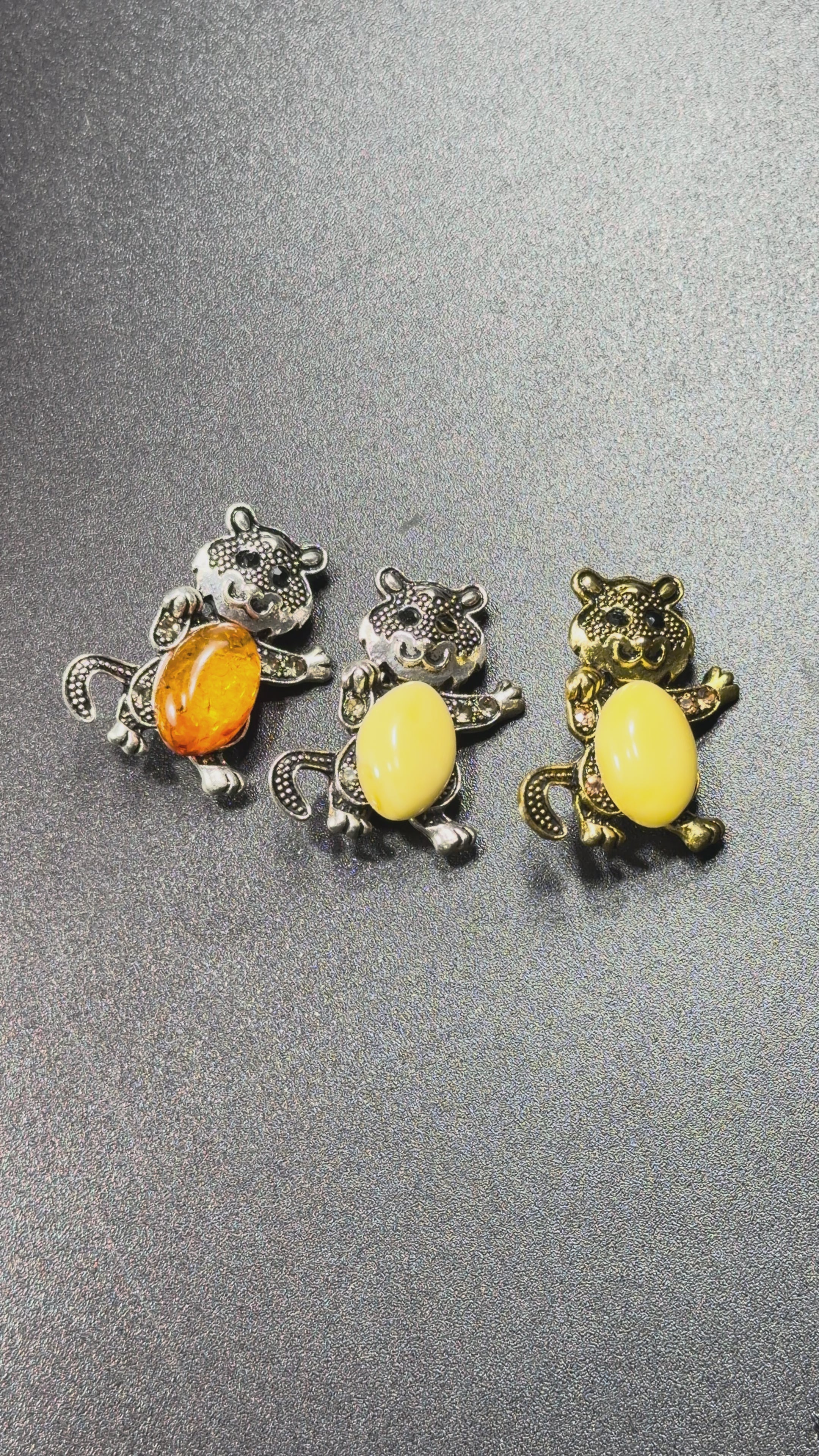 Load video: Made in USA Genuine Natural Baltic Amber Cat Brooch, Tail Down KIZIMA®