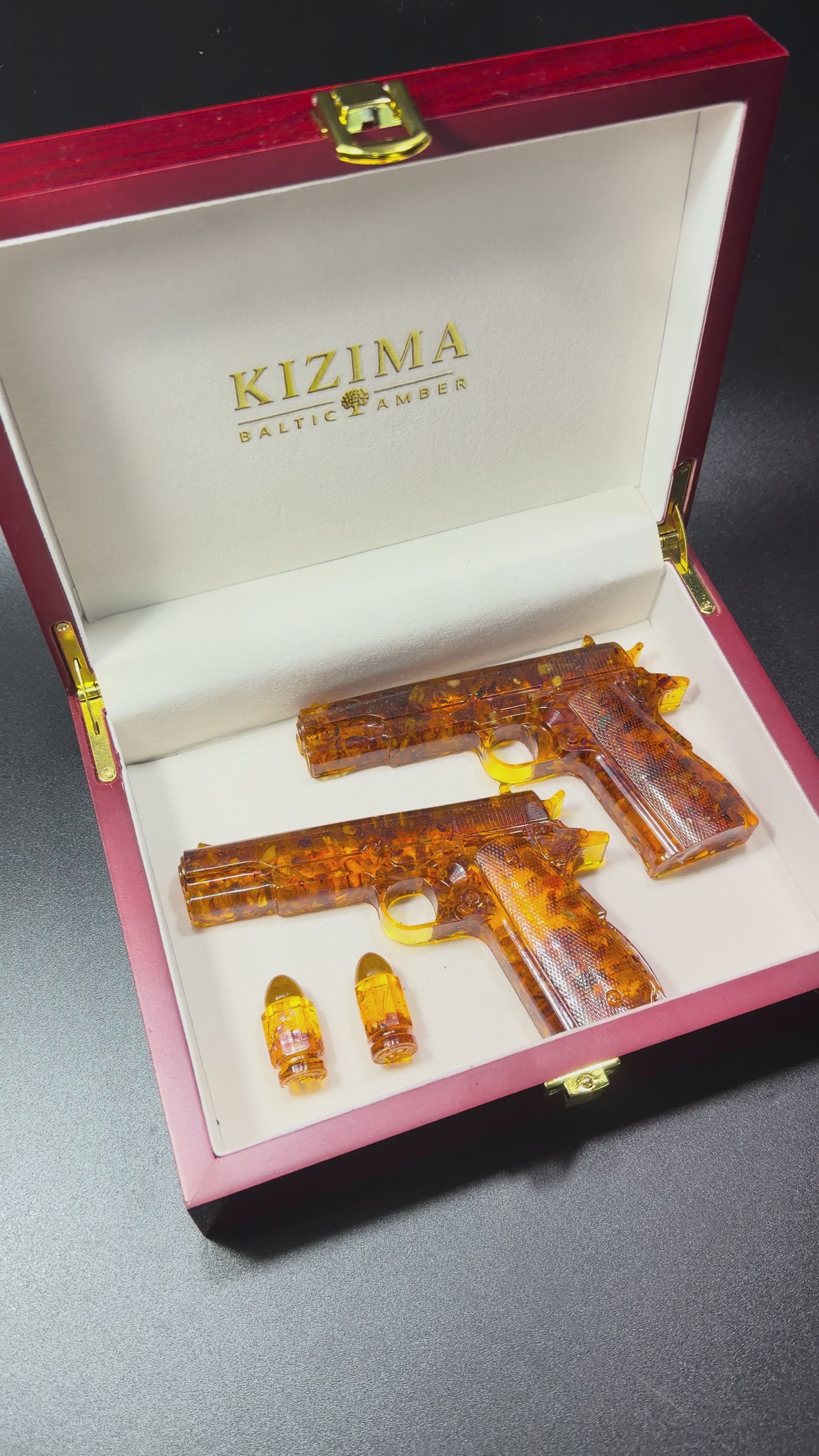 Load video: Made in USA Natural Baltic Amber Gun Figurine Collectible Decor KIZIMA®