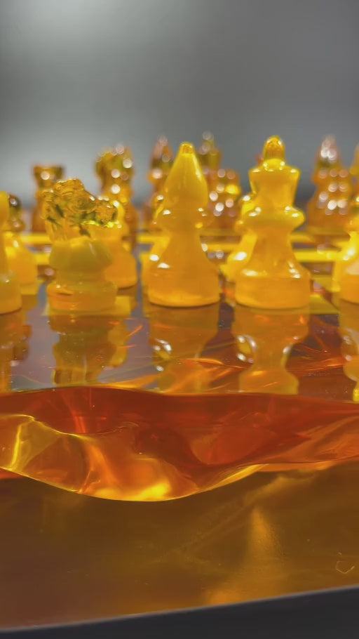 KIZIMA amber chess set shown in moving close-ups, followed by an executive office interior.