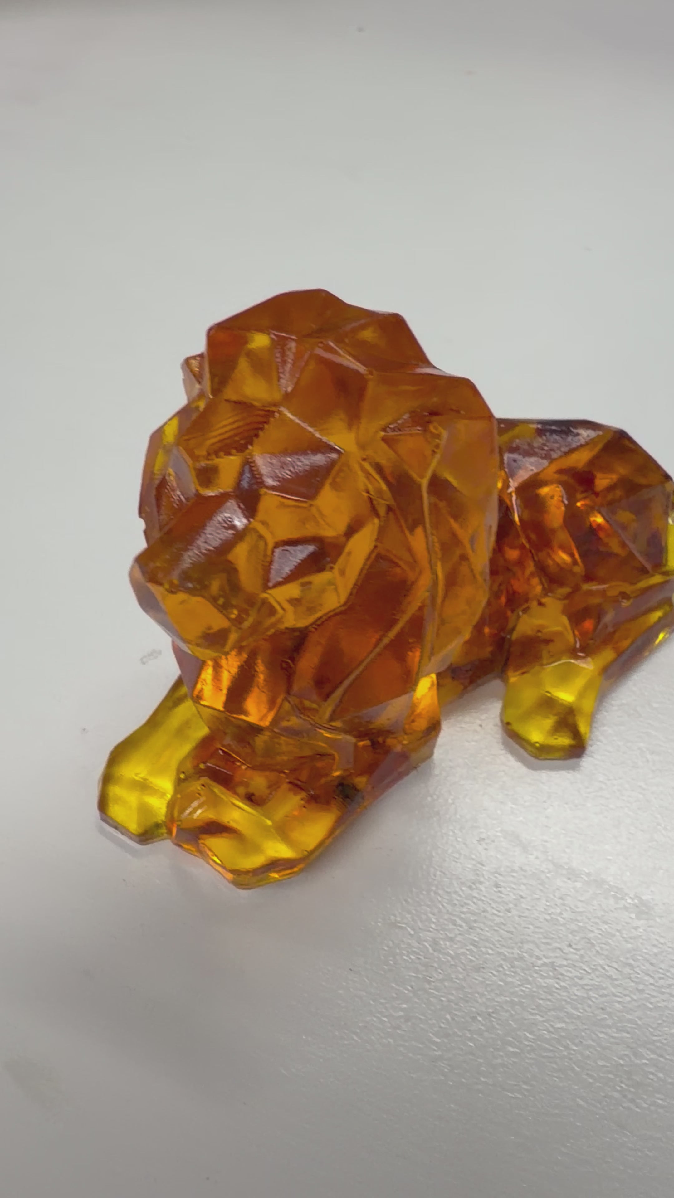 Load video: Leo Zodiac Lion Baltic Amber Figurine — Made in USA | KIZIMA®