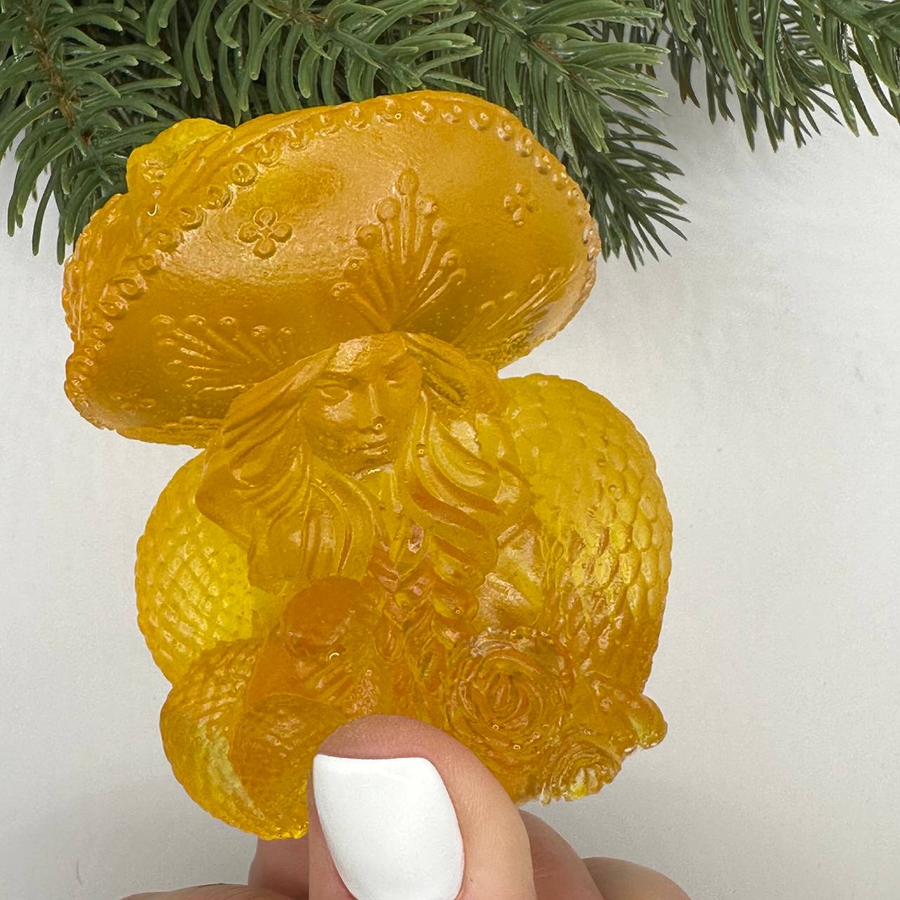 Baltic amber woman with snake statue by KIZIMA® — genuine amber gift, made in USA, close-up